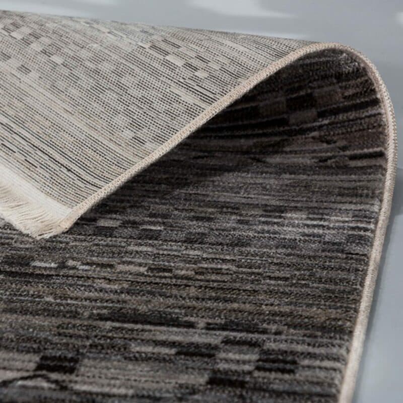 Astra „Mystik“ Teppich mit Design 193 Nahansicht der Kante.