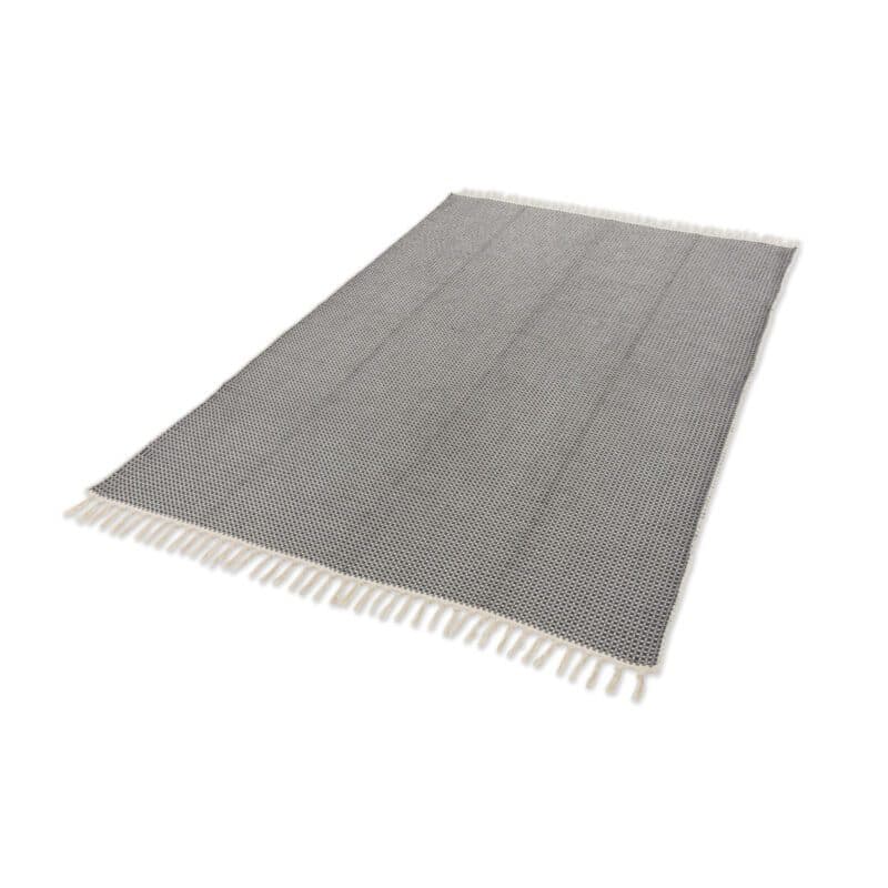 Schöner Wohnen Cottage Webteppich aus 100 % Baumwolle in der Farbe Grau.