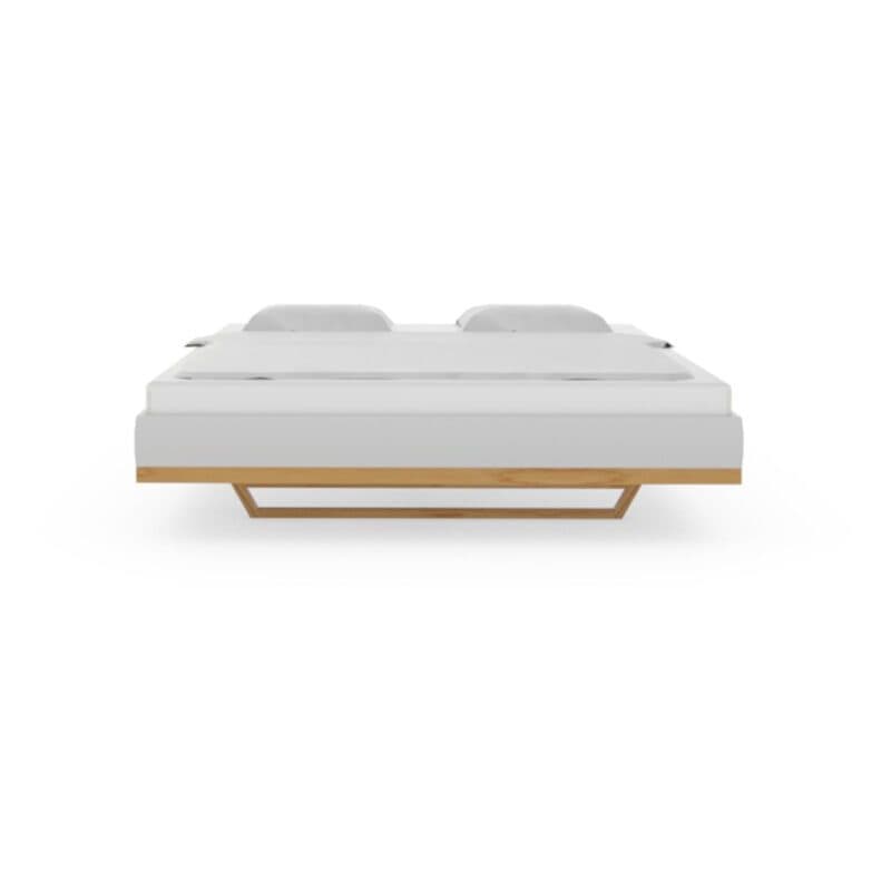 Team 7 Riletto Bett 180 x 200 cm in Kernbuche und weißem Leder.