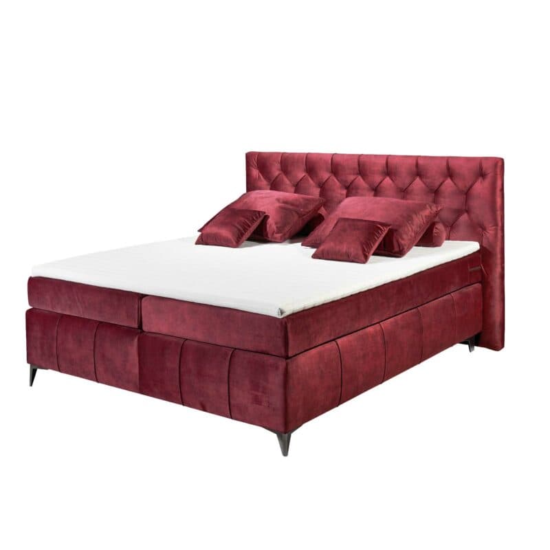 Trendstore Beth Boxspringbett in der Farbe Burgund mit Dekokissen