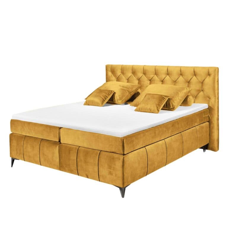 Trendstore Beth Boxspringbett in der Farbe Senfgelb mit Dekokissen