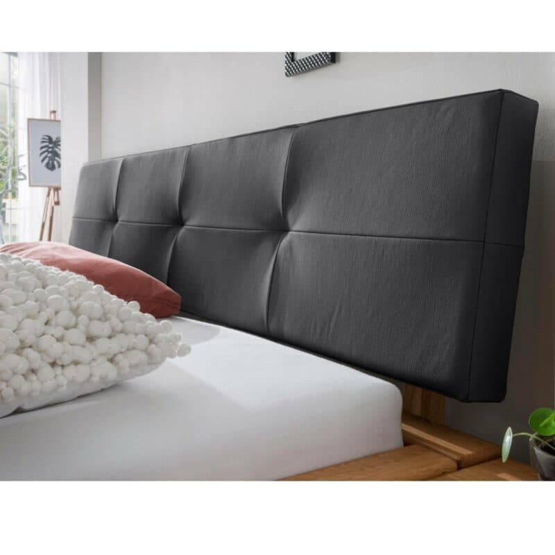 Natura Baltimore Bett aus massiver Wildeiche mit gepolstertem Kopfteil in Detailansicht.