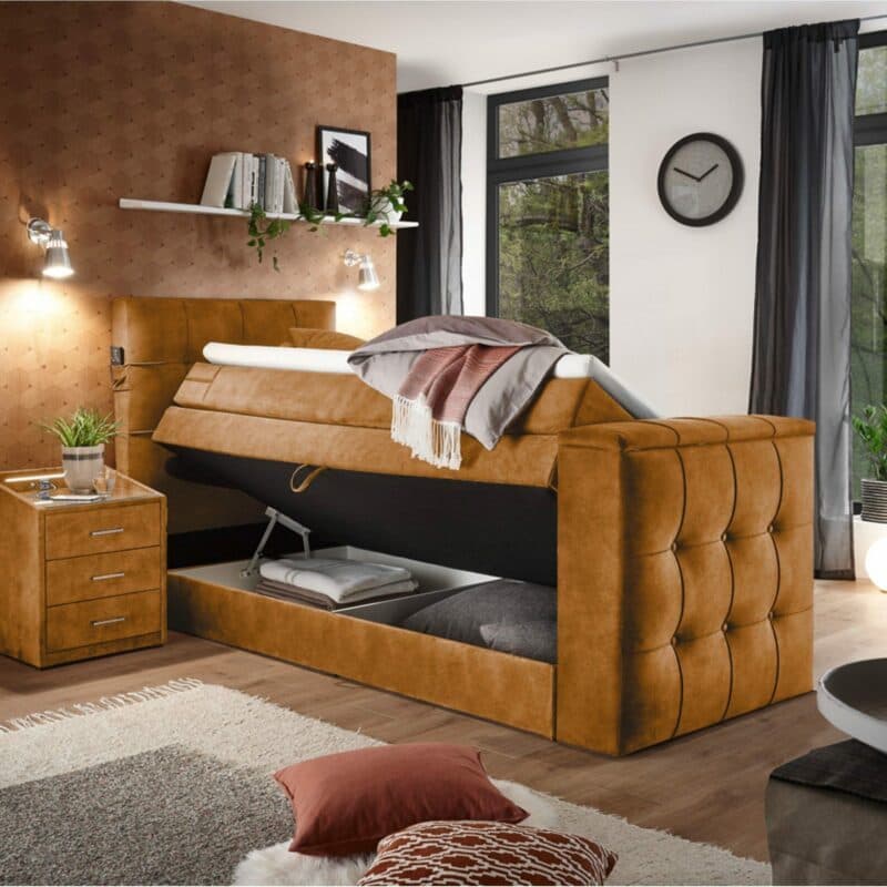 set one by Musterring richmond Boxspringbett 120 x 200 cm mit einem Microveloursbezug in Amber als Wohnbeispiel mit offenem Bettkasten