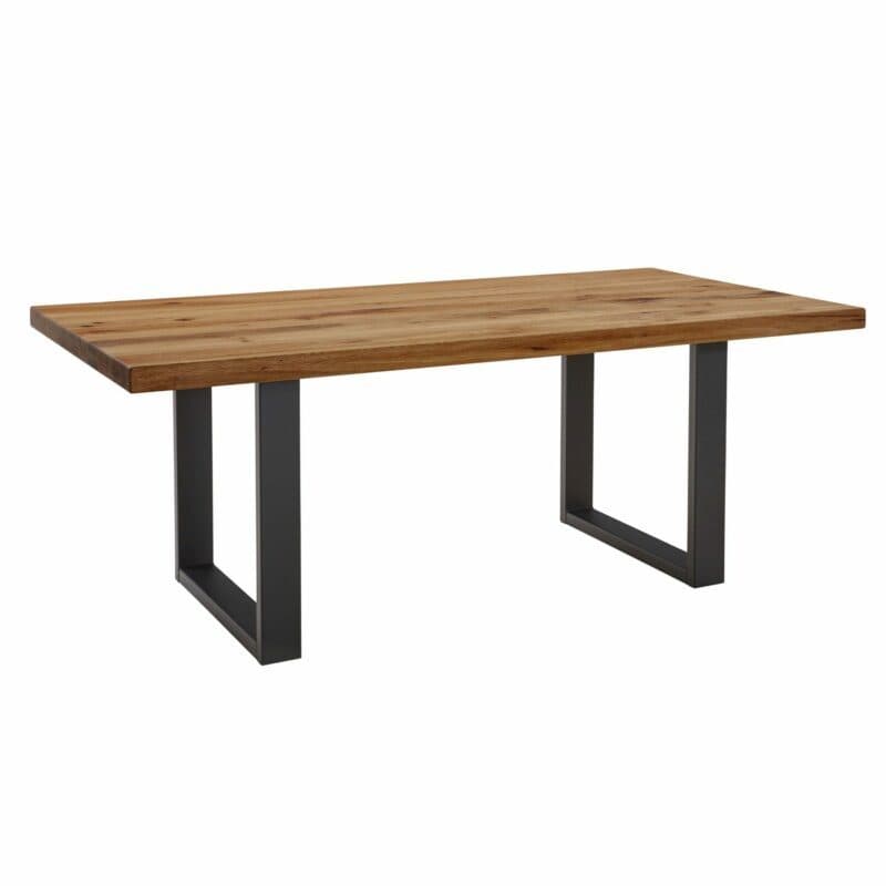 Trendstore Sitting Easy Esstisch aus massiver Zerreiche, geölt mit U-Gestell aus Metall in Schwarz.