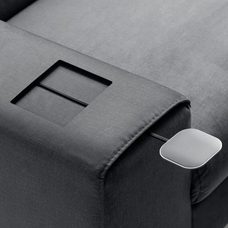 Trendstore Corin Ecksofa – integrierte Ladestation Smartphone