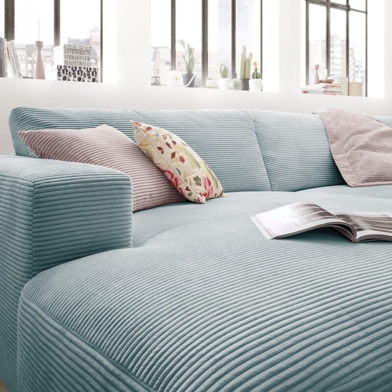 Musterring Lucia 3,5 Sitzer Ecksofa Cord mit Ottomane links und Bezug in Petrol – Perspektive
