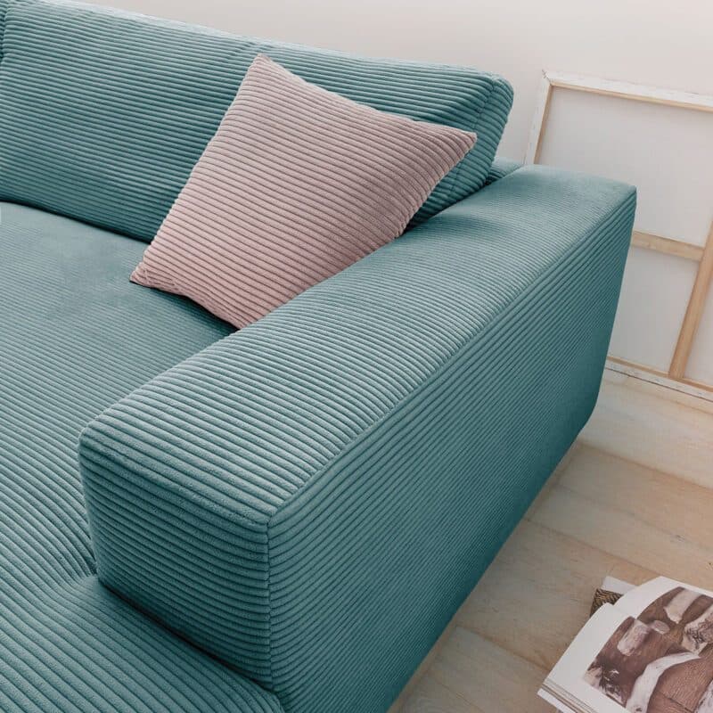 Musterring Lucia 3,5 Sitzer Ecksofa Cord mit Ottomane rechts und Bezug in Petrol – Detail Bezug