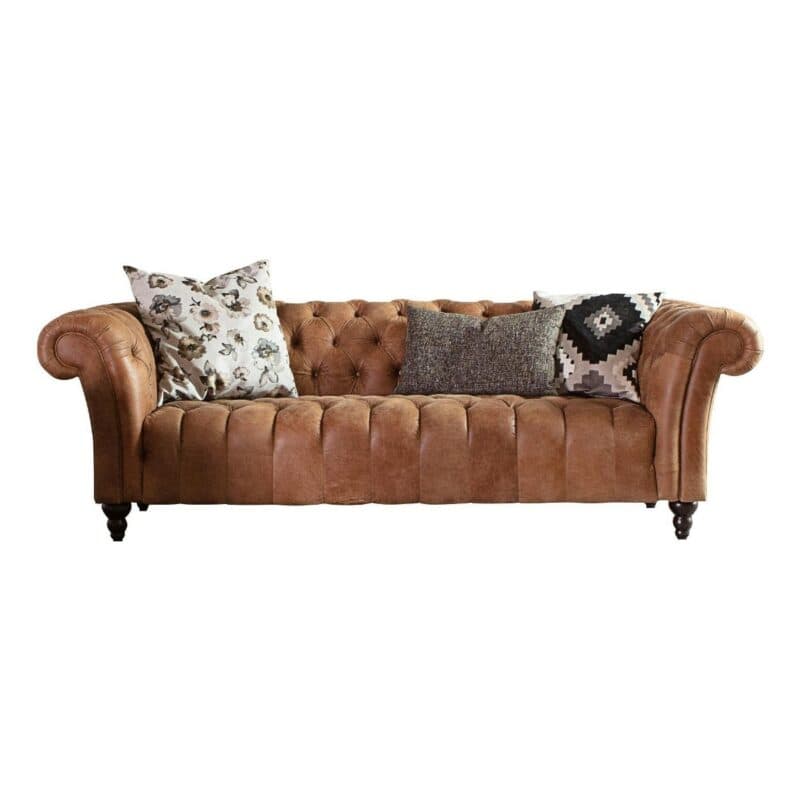Trendstore Garvin Bigsofa mit Bezug in Anilinleder Braun und Antik-Füße Schwarz mit Dekokissen.