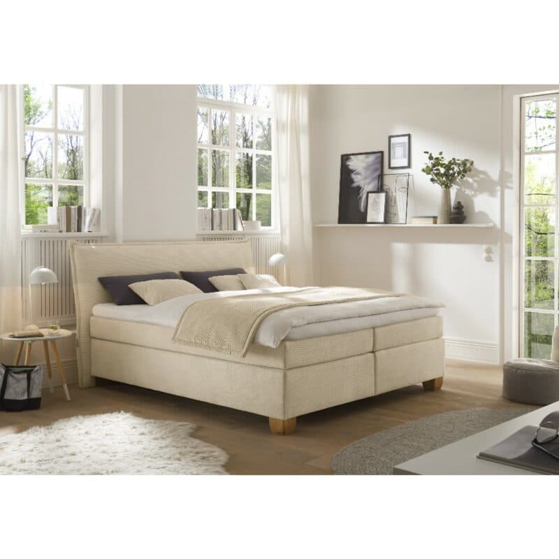 Trendstore Hadai Boxspringbett Cord vanille Wohnbeispiel