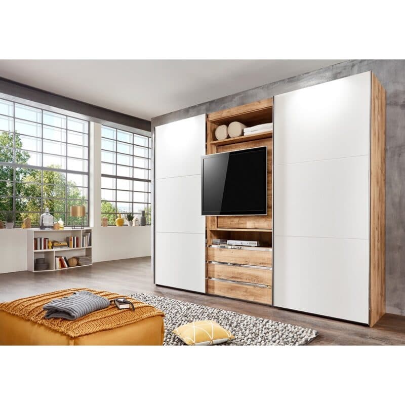 Wimex Magic TV-Schwebetürenschrank Plankeneiche Nachbildung, Dekor weiß 216 cm hoch Wohnbeispiel
