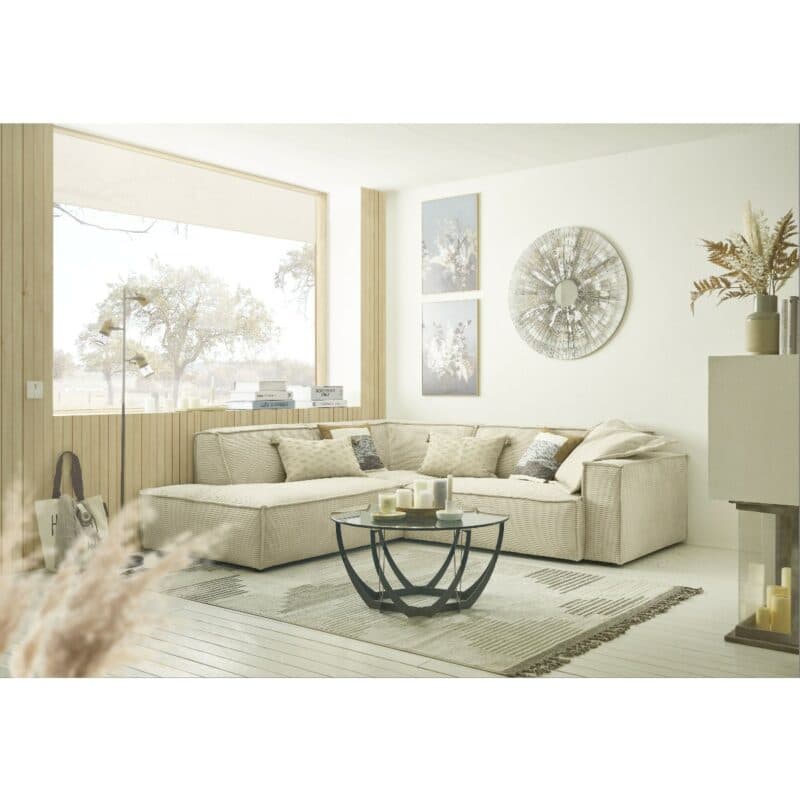 Trendstore Calina Echsofa mit Cordbezug in Natur und Ottomane links als Wohnbeispiel