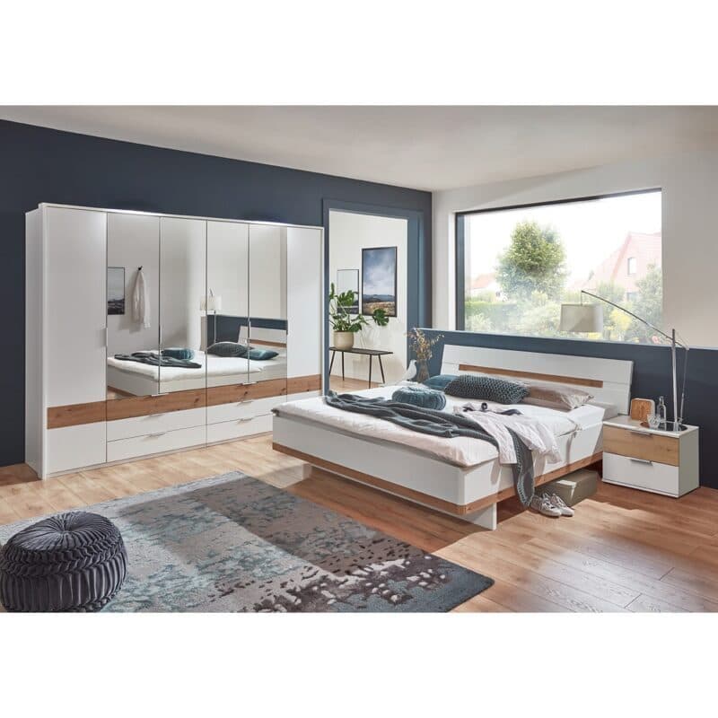 Wimex Gibraltar Schlafzimmer 4-teilig bestehend aus Drehtürenschrank 6-türig mit Passepartoutrahmen Doppelbett 180x200 Nachtkommoden Paar mit jeweils 2 Schubladen in Dekor weiß Absetzung Artisan Eiche Nachbildung Wohnbeispiel