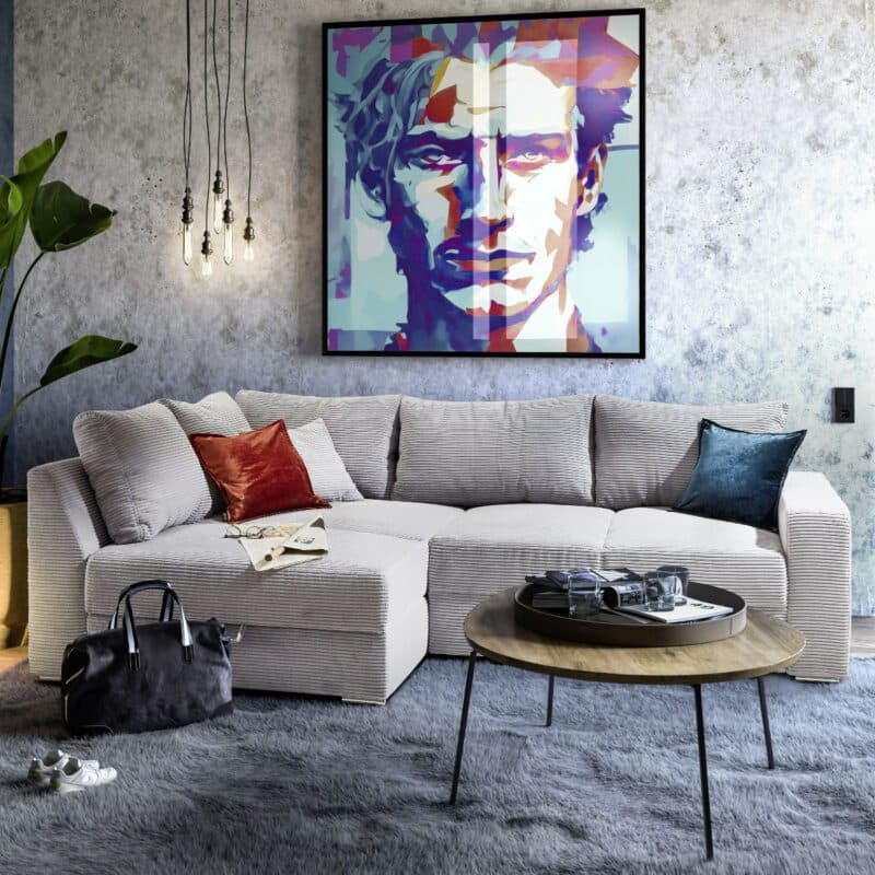 Trendstore Janis Ecksofa in Bezug Cord hellgrau inkl. Rücken- und Zierkissen, Ottomane rechts oder links montierbar, Wohnbeispiel.