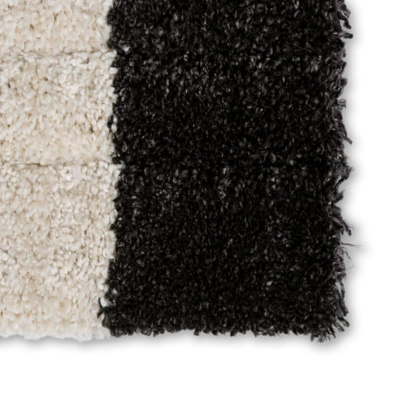 Schöner Wohnen Kollektion Winsome Teppich mit rundem Linien-Muster in Creme - Detail Ecke mi Kontraststreifen