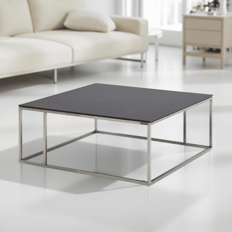 Musterring Nela Couchtisch mit Keramik-Platte Nero und Gestell aus Edelstahl - Wohnbeispiel